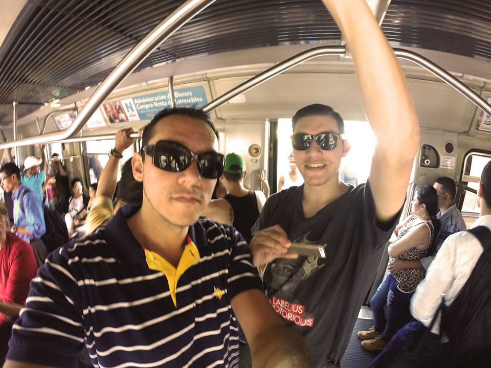 Andrew Macia and Francisco Macia on the Metro in Medellin